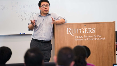 professor lecturing at podium