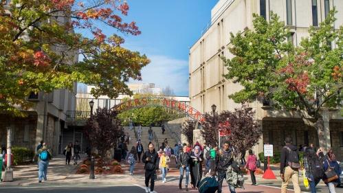 students walking under rutgers-newark arch