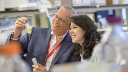 Professor and Research assistant in lab