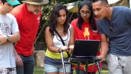 field researchers at laptop