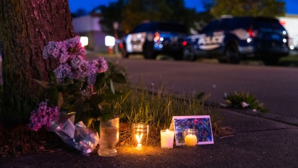 A small vigil set up with flowers