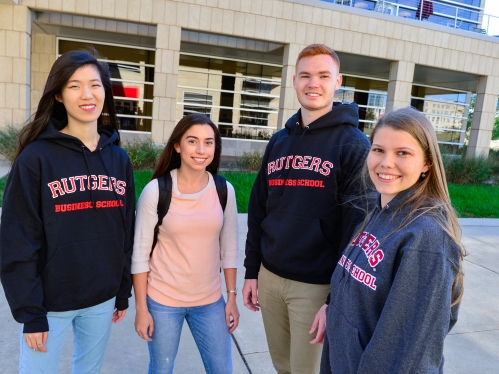 smiling group of business school students