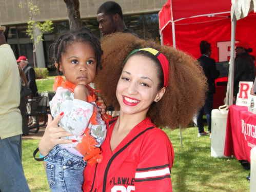 Girl holding a baby