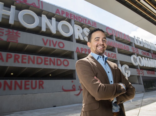 man in front of building