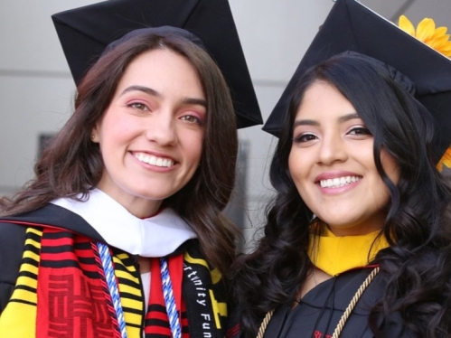 Student in cap and gown at Commencement