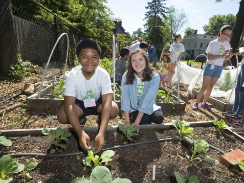 Women and boy at community garden