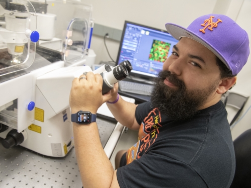 Young male scientist in lab