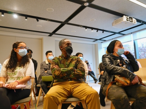 masked students in classroom looking to the right