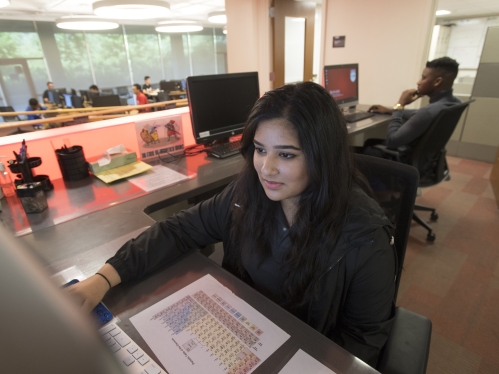 girl in office on the computer