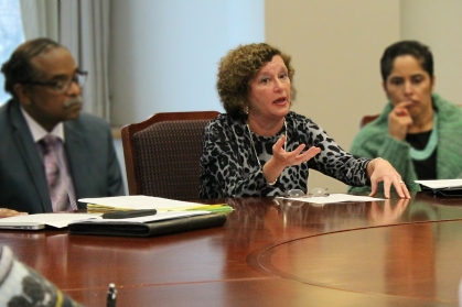 chancellor cantor speaking at a conference table