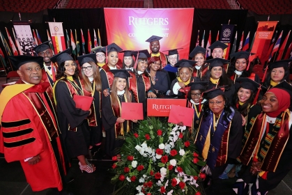 doctor arthur james hicks with graduates at commencement