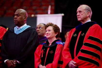 Mayor Baraka, chancellor Cantor, and president Barchi in robes at commencement